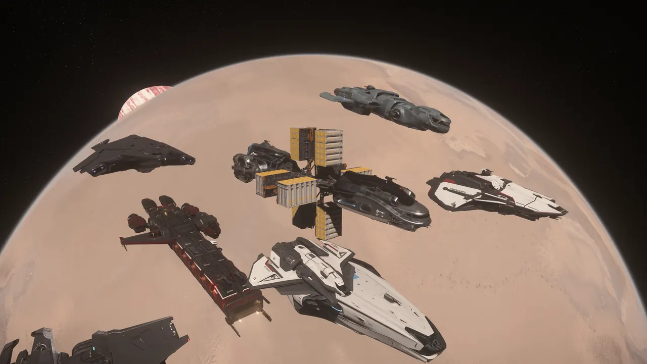 A fleet of ships flying in formation above an orange planet