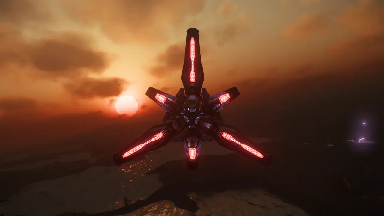 An alien ship silhouetted against a sunset